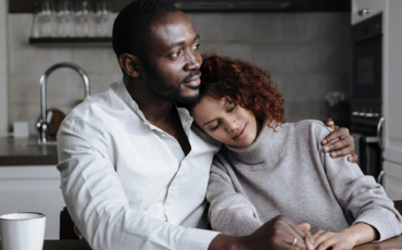 A couple reflecting on life after debt