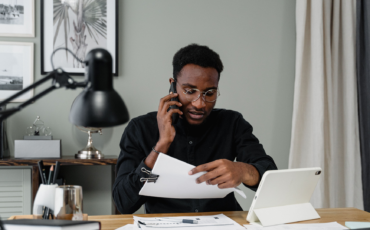 A man learning about the hidden costs of debt